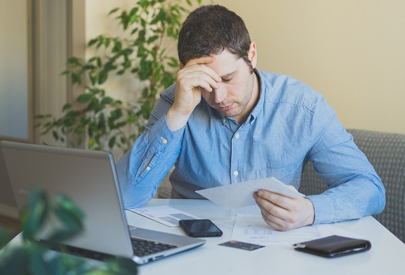 Man stressed over his bills